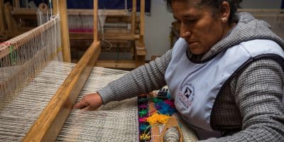 Woman from Community Working at Loom